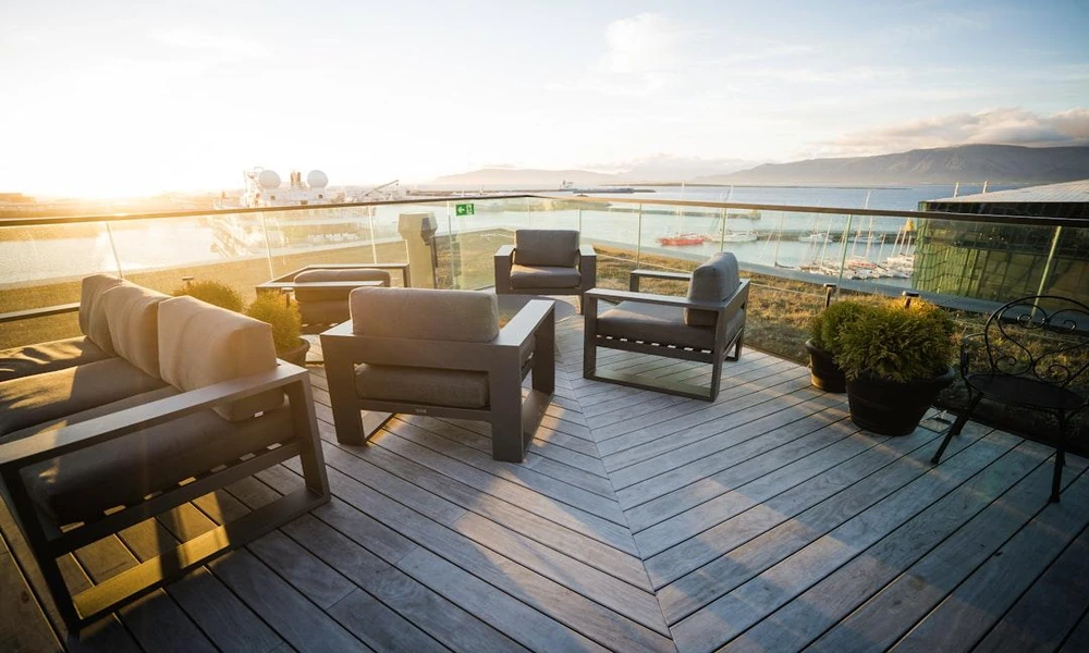 Enhancing Building Exteriors: Garage Doors and Rooftop Spaces